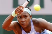 Coco Gauff of the U.S. returns the ball to Belgium's Alison Van Uytvanck during their second round match of the French Open tennis tournament at the Roland Garros stadium Wednesday, May 25, 2022 in Paris. (AP Photo/Jean-Francois Badias)
