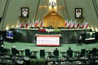 Iranian President Hassan Rouhani speaks during the opening ceremony of Iran's 11th parliament, as the spread of the coronavirus disease (COVID-19) continues, in Tehran