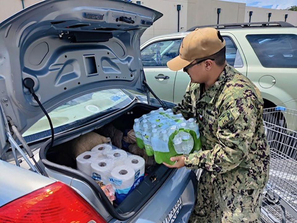 230828-N-YD641-003 
JACKSONVILLE, Fla. (Aug. 28, 2023) Mass Communications Specialist 2nd Class Matthew Riggs grabs some essentials at the Naval Air Station Jacksonville Commissary, Aug. 28 prior to Tropical Storm Idalia arriving in the Jacksonville area. (U.S. Navy photo by Master-at-Arms 3rd Class Scotty Coombs/Released)