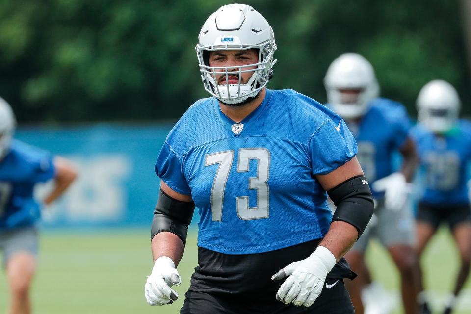 Detroit Lions guard Jonah Jackson (73) warms up during minicamp at Detroit Lions Headquarters and Training Facility in Allen Park on Tuesday, June 6, 2023.