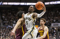 Purdue guard Brandon Newman (5) shoots during the second half of an NCAA college basketball game against Minnesota, Sunday, Dec. 4, 2022, in West Lafayette, Ind. (AP Photo/Doug McSchooler)