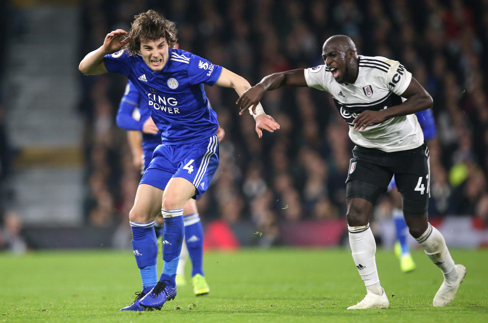 Leicester City's Caglar Soyuncu (left) and Fulham's Aboubakar Kamara battle for the ball during the Premier League match at Craven Cottage, London. (Photo by Steven Paston/PA Images via Getty Images)