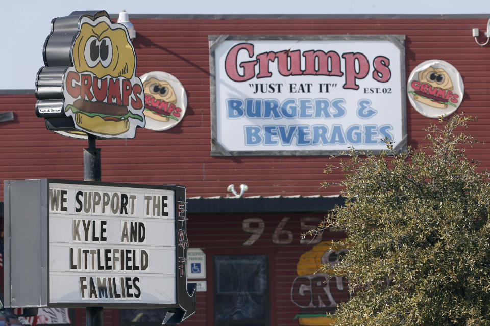 STEPHENVILLE, TX - FEBRUARY 11: Grumps Burgers and Beverages show their support for Chris Kyle's and Chad Littlefield's families on their street sign February 11, 2015 in Stephenville, Texas. Eddie Ray Routh, 27, of Lancaster, Texas is charged with the 2013 deaths of former Navy SEAL Chris Kyle and his friend Chad Littlefield at a shooting range near Glen Rose, Texas. (Photo by Brandon Wade/Getty Images)