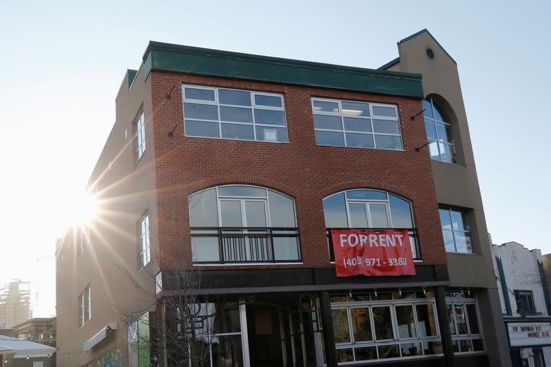 FILE PHOTO: A For Rent sign at a downtown office building in Calgary