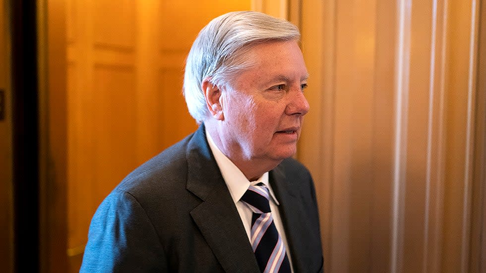 Sen. Lindsey Graham (R-S.C.) arrives to the Senate Chamber for a series of votes regarding nominations on Tuesday, February 1, 2022.