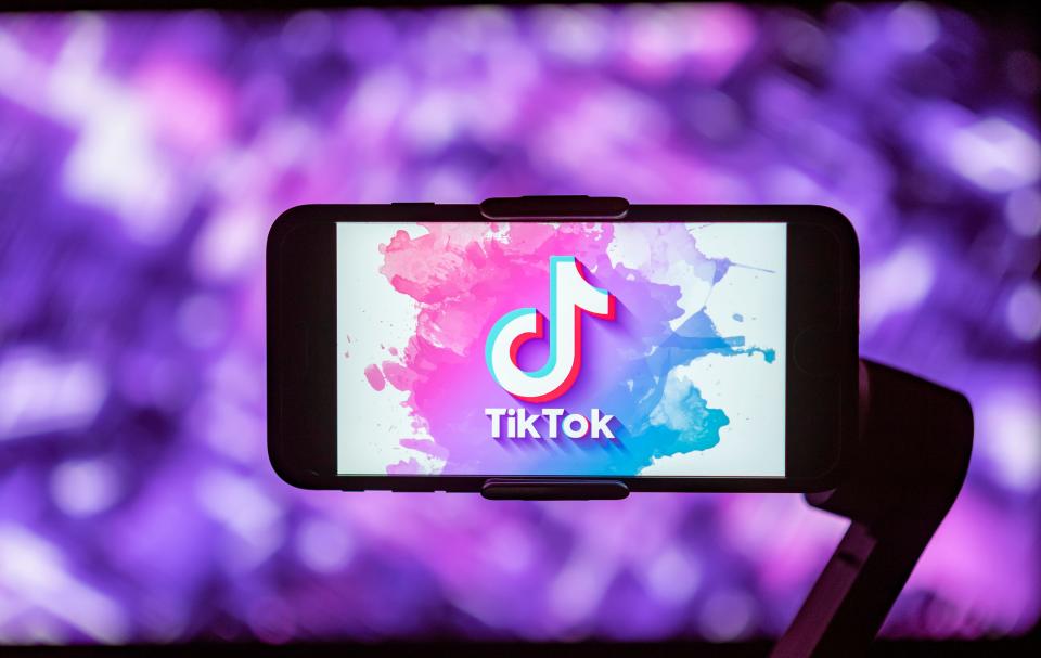 In this photo illustration, a TikTok logo is seen displayed on a mobile phone screen.