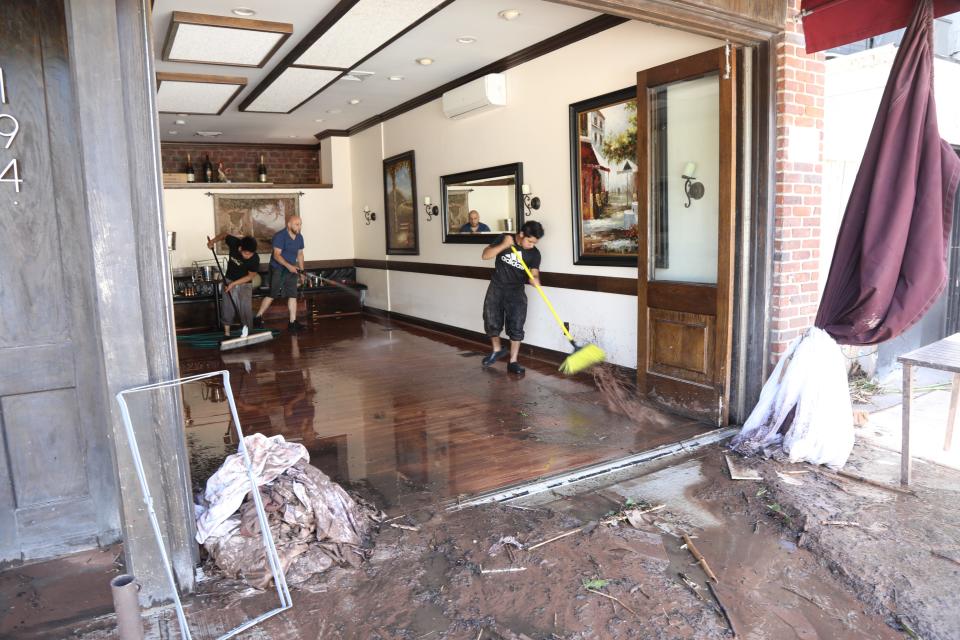 Intense rain from the remnants of Hurricane Ida caused widespread flooding in the Northeast last fall. The overflowing Rahway River sent flood waters pouring into this business, Casa Mia, on Essex Street in Millburn, New Jersey, where cleanup was underway on Sept. 2, 2021.