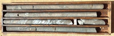 Figure 5: DDH2406T002 Massive/Semi-massive/ breccia sulphide mineralization at T6 target (57.0 – 60.7m shown). (CNW Group/Bravo Mining Corp.)