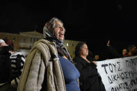 Women protest the shooting in the head of a 16-year-old youth, outside the Greek parliament , in central Athens Monday, Dec 5, 2022. A police officer has been arrested in northern Greece after a 16-year-old boy was shot in the head and seriously injured during a car chase after he allegedly failed to pay the bill at a gas station(AP Photo/Michael Varaklas)