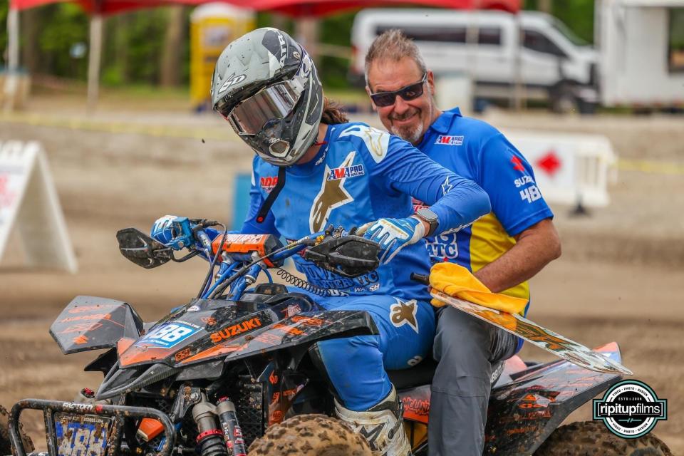 Dane Molander gives his dad, Donald Molander, a ride on his ATV. The Molander family, which also included mom/wife Kimberly and daughter/sister Miranda, were all killed Aug. 9 in a crash on Interstate 81 near Chambersburg.