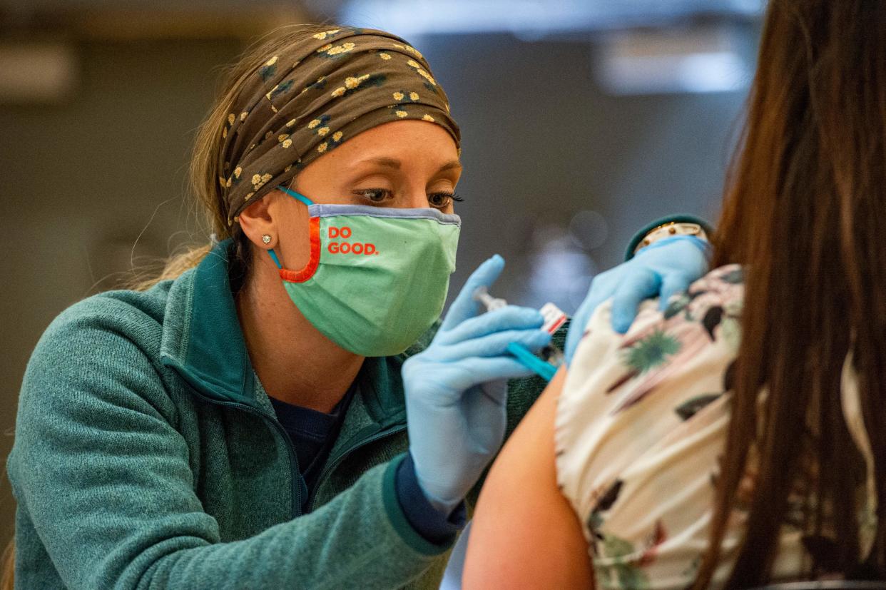 A medical worker administers the Jansen (Johnson and Johnson) Covid-19 vaccine to the public at a FEMA run mobile Covid-19 Vaccination clinic at Biddeford High School in Bidderford, Maine on April 26, 2021. - The clinic is jointly run by FEMA and the state of Maine with the help of other federal agencies and the Maine National Guard. The United States has resumed vaccinations with the Johnson & Johnson shot, the third authorised injection, after a brief pause over links to a rare form of clotting. (Photo by Joseph Prezioso / AFP) (Photo by JOSEPH PREZIOSO/AFP via Getty Images)