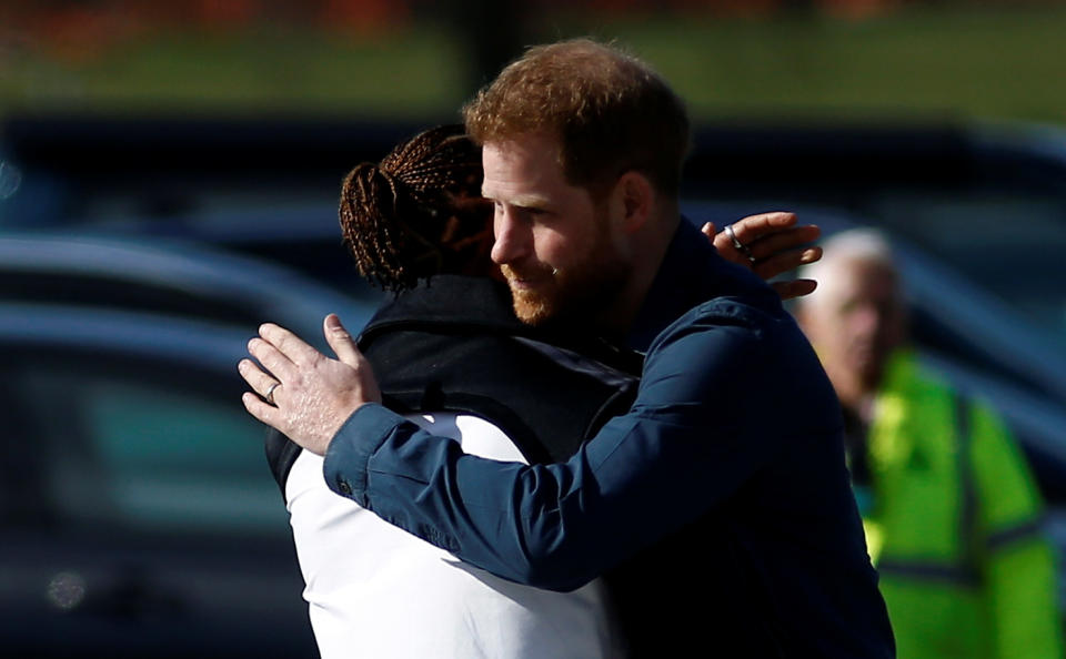 NORTHAMPTON, ENGLAND - MARCH 06: Prince Harry, Duke of Sussex embraces Formula One World Champion Lewis Hamilton as he officially opens The Silverstone Experience at Silverstone on March 6, 2020 in Northampton, England. (Photo by Peter Nicholls-WPA Pool/Getty Images)