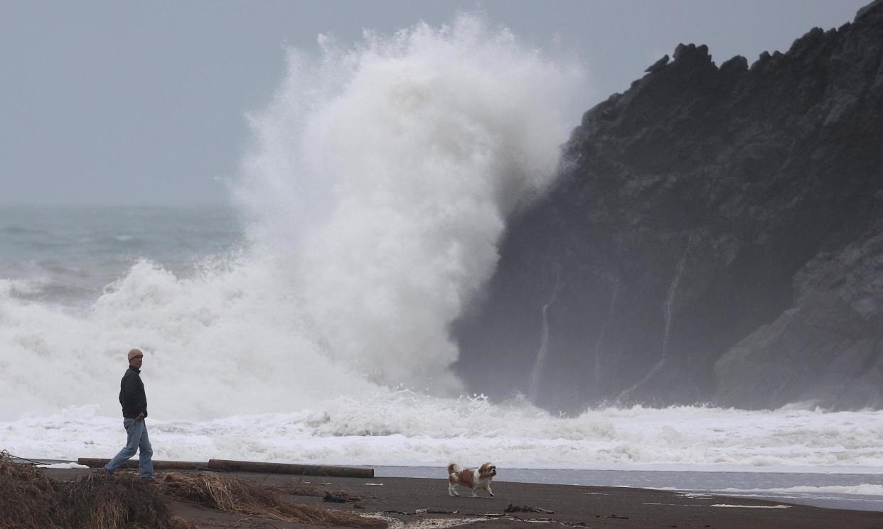 <span>Rains batter the beach at Sausalito in northern California.</span><span>Photograph: Justin Sullivan/Getty Images</span>