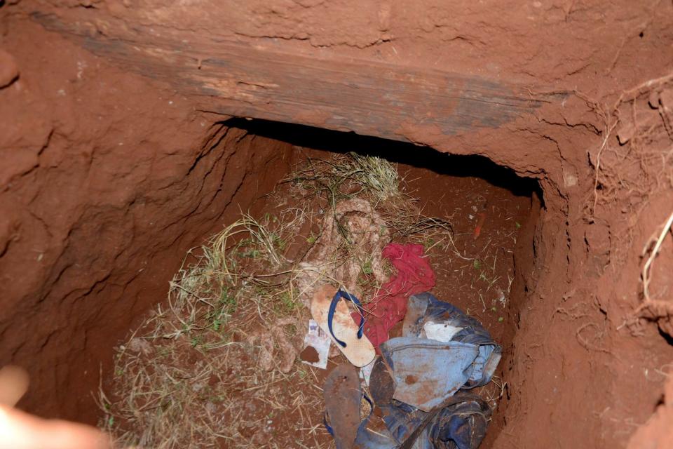 Clothes are seen in a tunnel entrance at Pedro Juan Caballero city jail (AP)