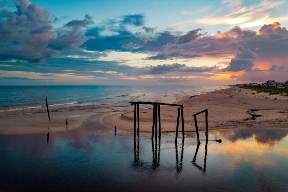 Remains of the old fishing pier at Camp Helen are still standing and serve as a reminder of the rich history of the park.