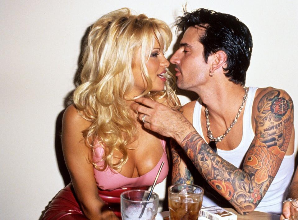 Pamela Anderson and Tommy Lee look affectionately at each other