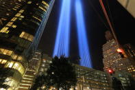 <p>The Tribute in Light rises above the New York City skyline from the entrance of the Battery Tunnel, Sept. 11, 2018. (Photo: Gordon Donovan/Yahoo News) </p>
