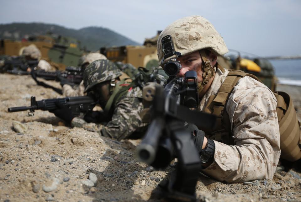 U.S. and South Korean marines participate in a U.S.-South Korea joint landing operation drill in Pohang March 31, 2014. The drill is part of the two countries' annual military training called Foal Eagle, which began on February 24 and runs until April 18. (REUTERS/Kim Hong-Ji)