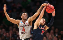 <p>Nickeil Alexander-Walker #4 of the Virginia Tech Hokies competes for the ball wtih Georgie Pacheco-Ortiz #11 of the Liberty Flames in the second half during the second round of the 2019 NCAA Men’s Basketball Tournament at SAP Center on March 24, 2019 in San Jose, California. (Photo by Ezra Shaw/Getty Images) </p>