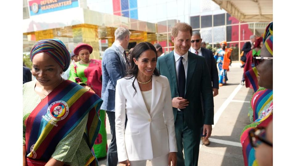 Meghan Markle wearing white suit at defence headquarters in Nigeria
