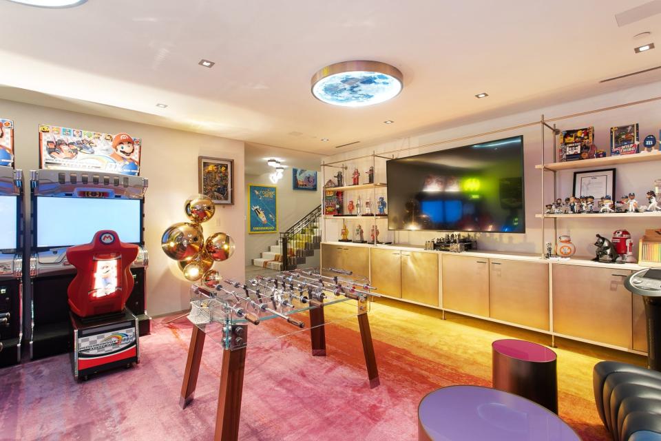 A kids play room features a variety of games.