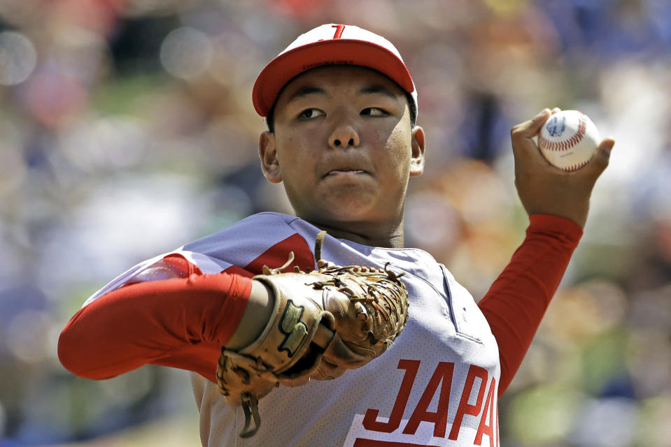 Japan's Taishi Kawaguchi (24) delivers during the second inning of the International Championship baseball game against Curacao at the Little League World Series tournament in South Williamsport, Pa., Saturday, Aug. 24, 2019. (AP Photo/Gene J. Puskar)