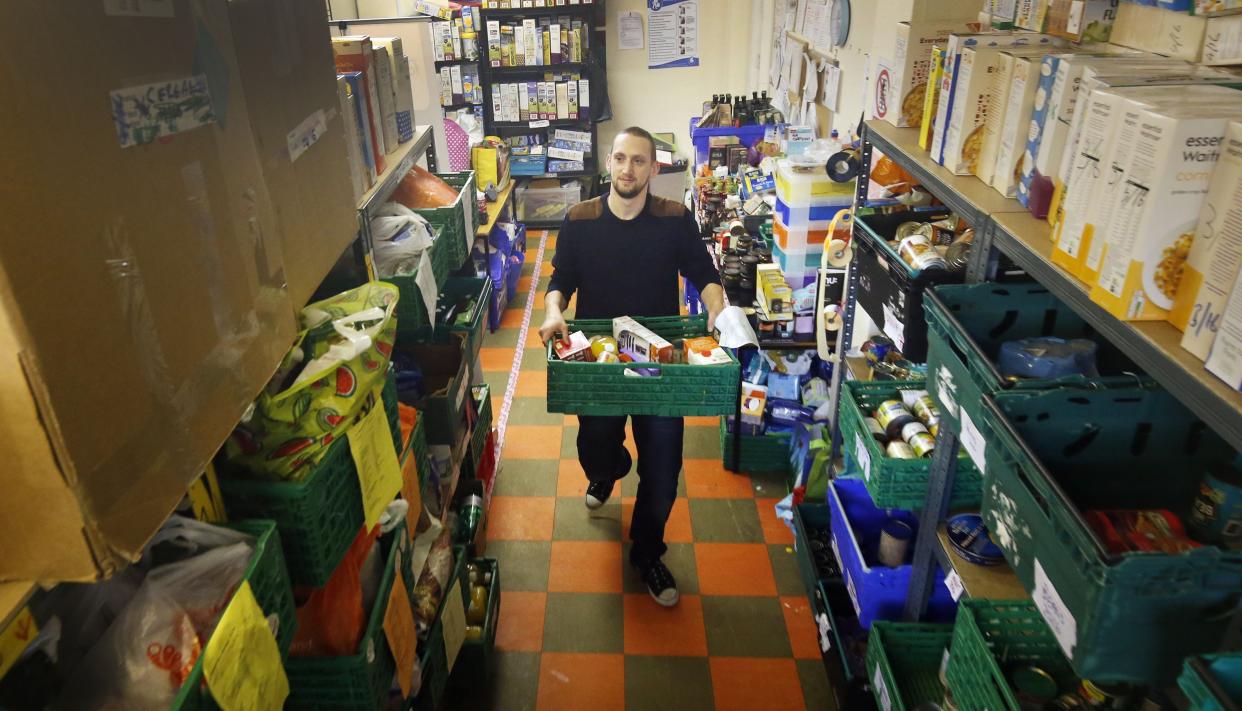 Kyle McCormick at a Trussell Trust foodbank in Blawarthill Parish Church, Glasgow, as anti-poverty charities are calling on the Scottish Government and employers to do more to help families avoid crisis in a new report on foodbank use.