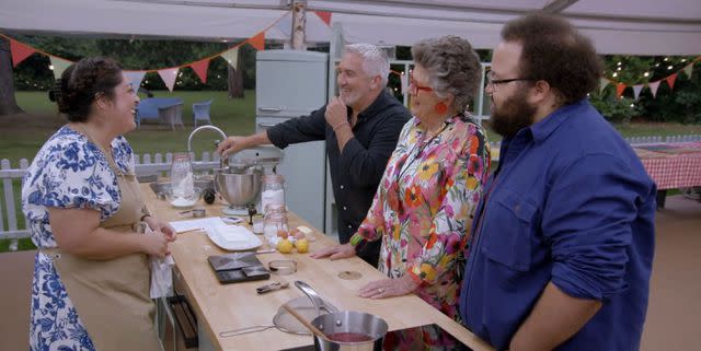 <p>The Roku Channel</p> Paul Hollywood, Prue Leith and Zach Cherry speak with a contestant in season 2 of 'The Great American Baking Show'