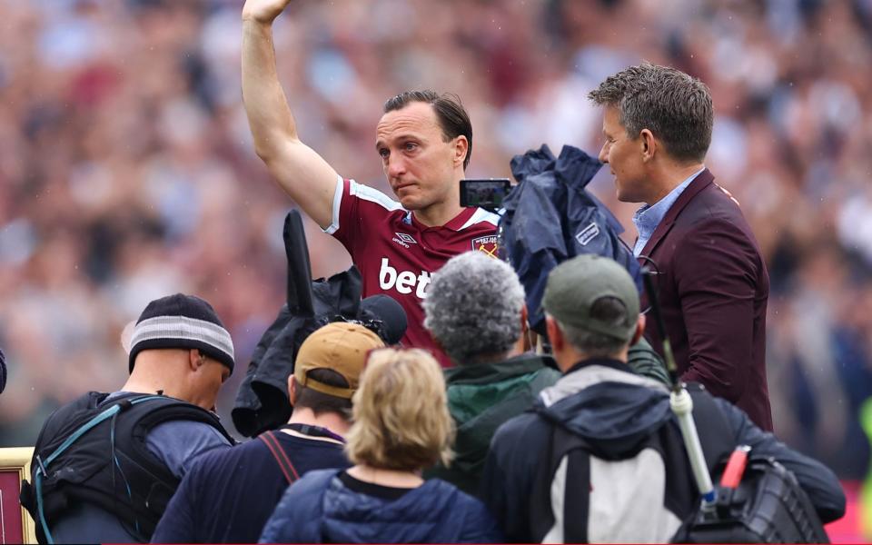 Mark Noble is surrounded by media as he says farewell to the West Ham fans - Jacques Feeney/Offside/Offside via Getty Images