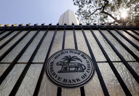 The Reserve Bank of India (RBI) seal is pictured on a gate outside the RBI headquarters in Mumbai, February 2, 2016. REUTERS/Danish Siddiqui/Files