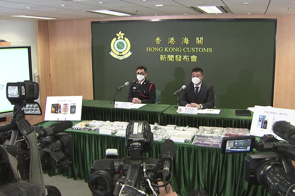 In this image made from a video, Hong Kong Customs officials speak at a press conference in Hong Kong, Friday, Jan. 27, 2023. Hong Kong banned cannibidiol, also known as CBD, as a "dangerous drug" and imposed harsh penalties for possession on Wednesday, forcing fledging businesses to shut down and revamp. (AP Photo/Alice Fung)