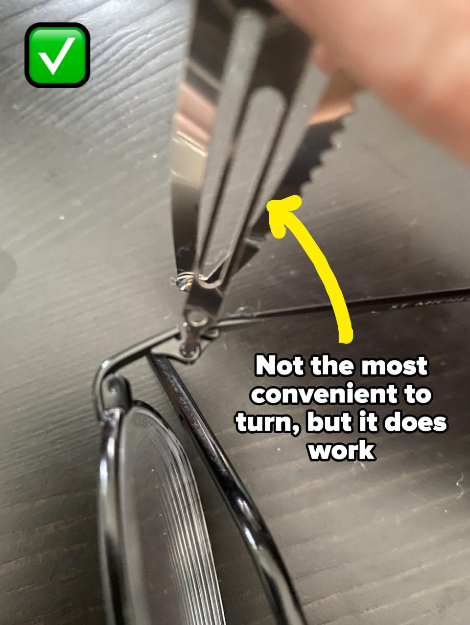 the clip being used to unscrew some glasses