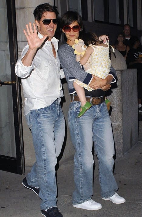 Photo by: Splash News<br>Tom Cruise and Katie Holmes-<br>We've heard of boyfriend jeans, but we're pretty sure Katie is wearing the exact same pair as her man and they're awful.