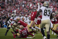 San Francisco 49ers cornerback Jimmie Ward (1) reaches for a fumble by New Orleans Saints running back Alvin Kamara (41) during the second half of an NFL football game in Santa Clara, Calif., Sunday, Nov. 27, 2022. 49ers linebacker Dre Greenlaw (57) recovered the ball. (AP Photo/Godofredo A. Vásquez)