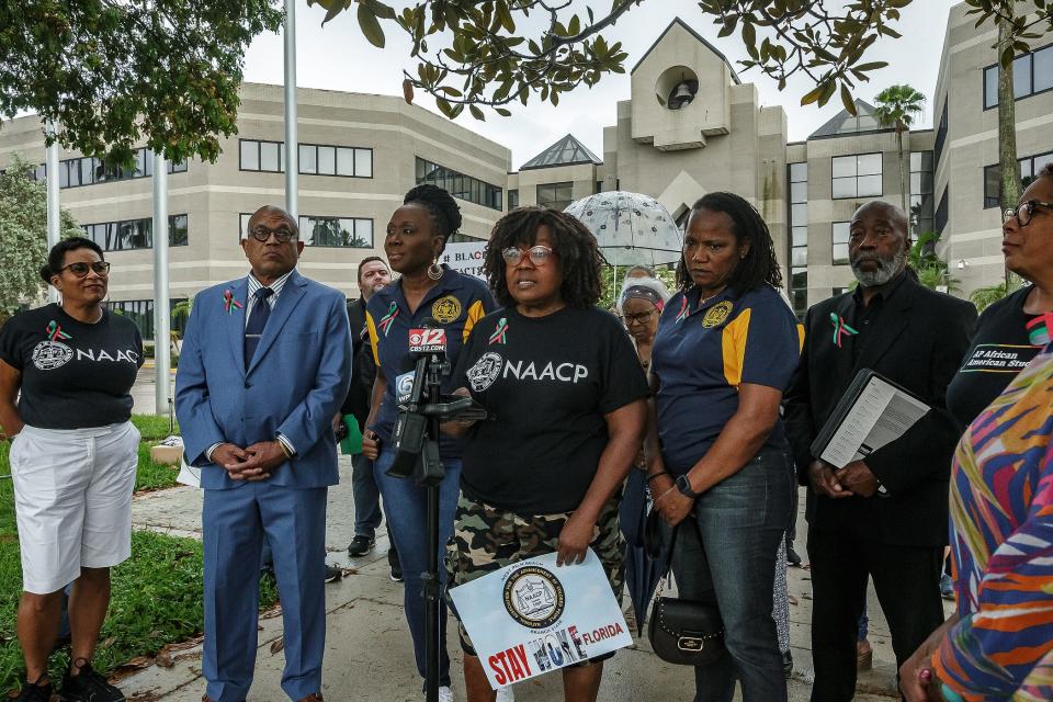 Lynne Hubbard of Riviera Beach speaks during the news conference Wednesday.