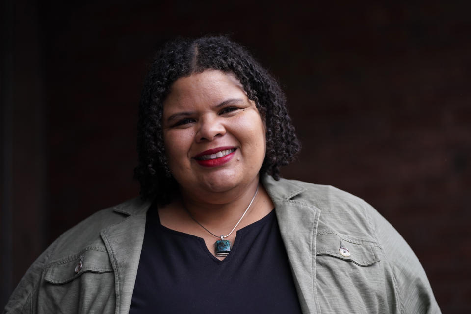 Ashindi Maxton, co-founder of the Donors of Color Network, poses for The Associated Press, Wednesday, Feb. 3, 2021, in Baltimore. The philanthropic group dedicated to pushing for racial equity in funding environmental projects nationwide, launched a pledge drive challenging the nation’s top climate funders to shift 30% of their donations toward environmental efforts led by Black, Indigenous and other people of color. (AP Photo/Julio Cortez)