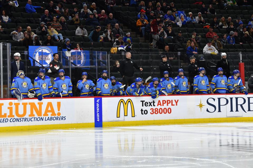 St. Cloud Cathedral players watch from the bench during the state hockey tournament Wednesday.