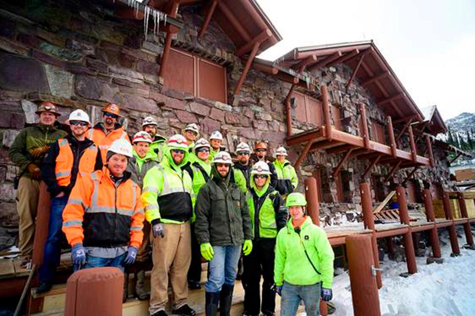 The Dick Anderson Construction crew poses on the steps of the newly rebuilt Sperry Chalet in Glacier National Park, Mont.