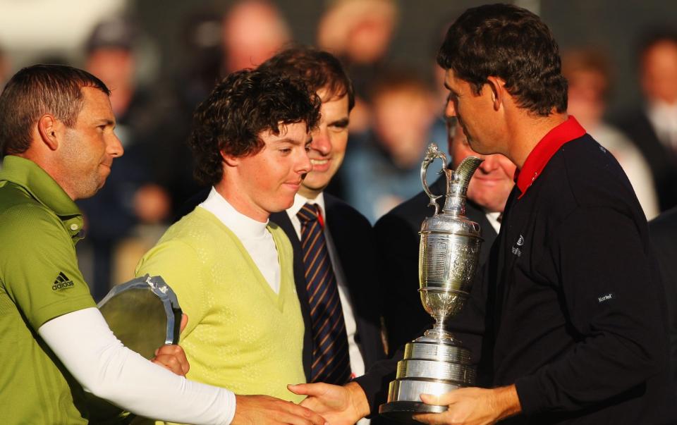 Padraig Harrington shakes hands with Sergio Garcia during the presentation of the Claret Jug in 2007. - GETTY IMAGES