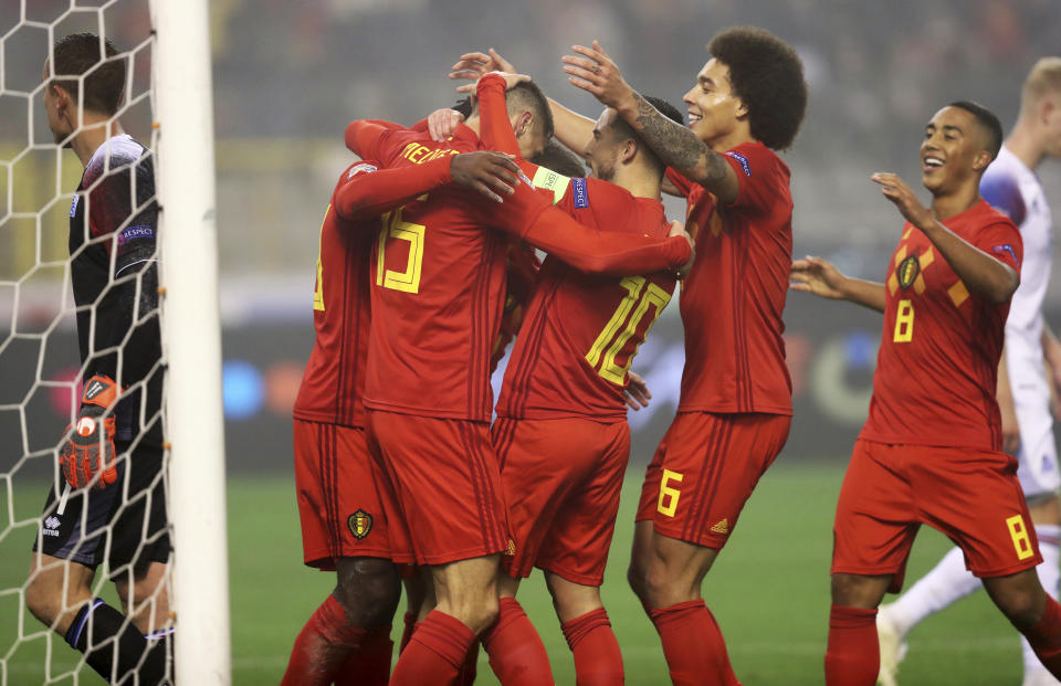 Belgia team players jubilate after Belgium's Michy Batshuayi, second left, scored his sides first goal during the UEFA Nations League soccer match between Belgium and Iceland at the King Baudouin stadium in Brussels, Thursday, Nov. 15, 2018. (AP Photo/Francisco Seco)