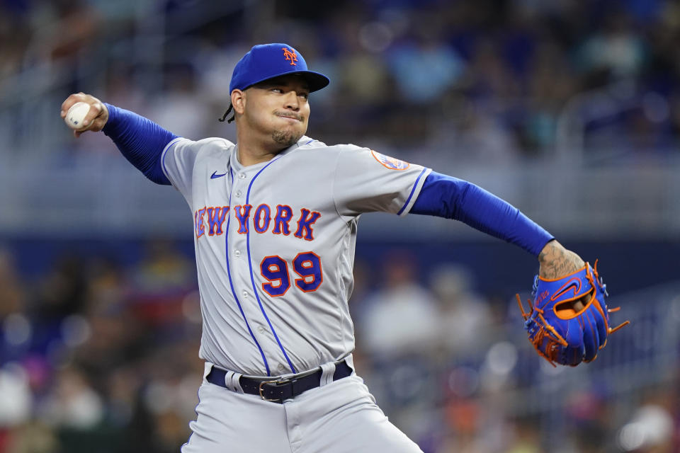 New York Mets' Taijuan Walker delivers a pitch during the first inning of a baseball game against the Miami Marlins, Sunday, July 31, 2022, in Miami. (AP Photo/Wilfredo Lee)