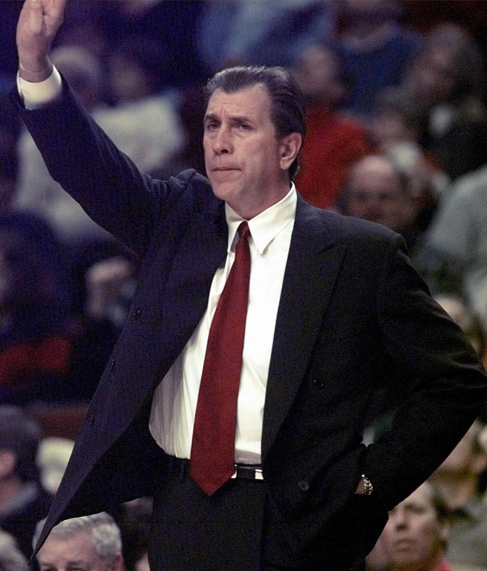 FILE - In this Jan. 18, 1998, file photo, Houston Rockets coach Rudy Tomjanovich signals his team during the first quarter against the Chicago Bulls in Chicago. The votes are in, and word is about to come if this finally is the year that former Rockets coach Tomjanovich gets the call from the Basketball Hall of Fame. He's got support from many within the NBA, and his resume has far more than two NBA titles won as coach of the Rockets. The Hall will announce this year's enshrinement class on Saturday. (AP Photo/Michael S. Green, File)