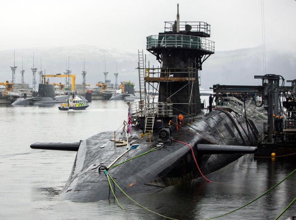 Vanguard-class submarine HMS Vigilant (front right), one of the UK’s four nuclear warhead-carrying submarines, with Astute-class submarines HMS Artful (back left) and HMS Astute (back 2nd left) at HM Naval Base Clyde, also known as Faslane (Danny Lawson/PA) (PA Archive)