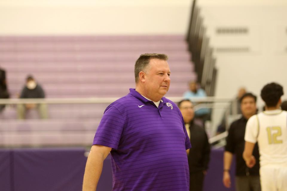 Kirtland Central boys basketball head coach Brian Dowdy during pregame ceremonies for a district basketball game against Aztec, Wednesday, Jan. 25, 2023 at Bronco Arena.