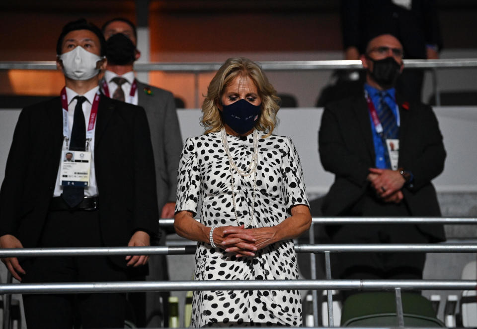 U.S. first lady Jill Biden observes a moment of silence during the opening ceremony of the Tokyo Olympics, July 23, 2021. / Credit: DYLAN MARTINEZ / REUTERS