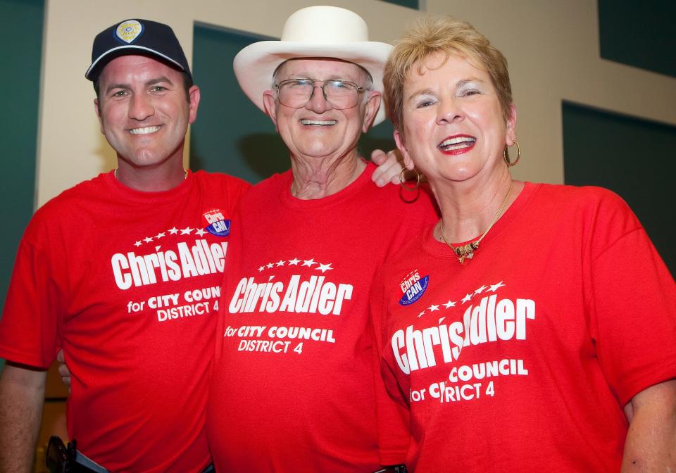 Chris Adler, right, celebrates her victory in the race for the Corpus Christi City Council District 4 seat with her husband, Robert Adler, center, and her son Mat Adler in this April 2009 file photo.