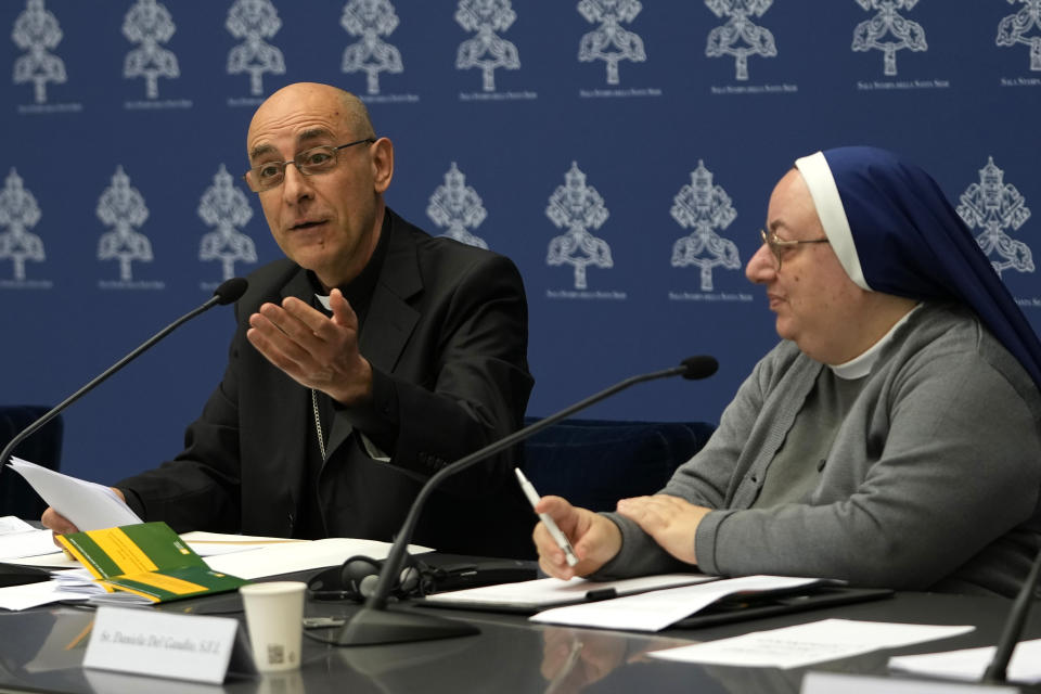 Argentine Cardinal Victor Manuel Fernandez, left, head of the Vatican doctrine office, is flanked by Sister Daniela del Gaudio, head of he Observatory on Marian Apparitions and Mystical Phenomenon, during a press conference at the Vatican, Friday, May 17, 2024. The Vatican on Friday radically reformed its process for evaluating alleged visions of the Virgin Mary, weeping statues and other seemingly supernatural phenomena that have long punctuated church history, putting the brakes on making definitive declarations unless the event is obviously fabricated. (AP Photo/Alessandra Tarantino)