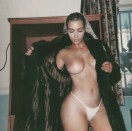 <p>This one <em>just</em> passed the censors! The<i> Keeping Up With the Kardashians</i> star had someone on her team do a little Photoshop magic on this particularly racy shot in which she wore a big overcoat, a small g-string, and … well, that’s all, folks. (Photo: <a rel="nofollow noopener" href="https://www.instagram.com/p/BejK5AaFvpV/?hl=en&taken-by=kimkardashian" target="_blank" data-ylk="slk:Kim Kardashian via Instagram;elm:context_link;itc:0;sec:content-canvas" class="link ">Kim Kardashian via Instagram</a>) </p>