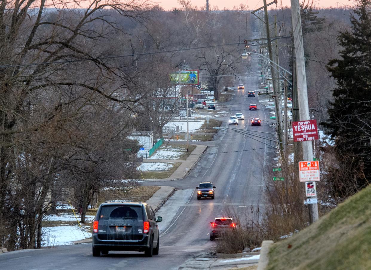 A steady stream of traffic travels up and down Laramie Street in South Peoria on Friday, Jan. 21, 2022.