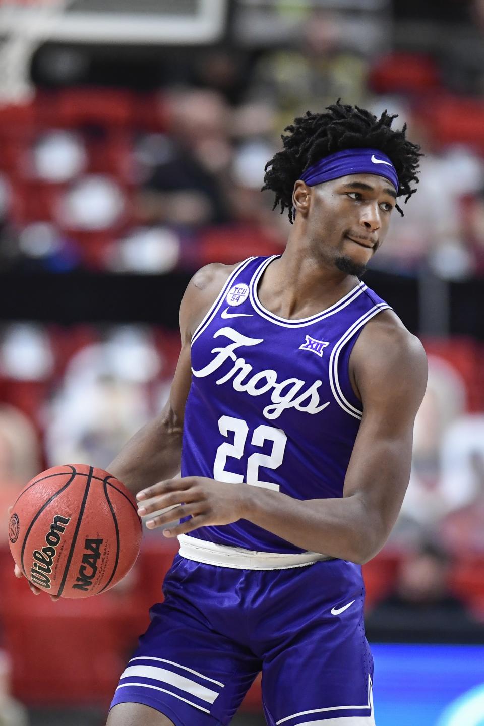 TCU's RJ Nembhard (22) controls the ball during the second half of an NCAA college basketball game against Texas Tech in Lubbock, Texas, Tuesday, March 2, 2021. (AP Photo/Justin Rex)